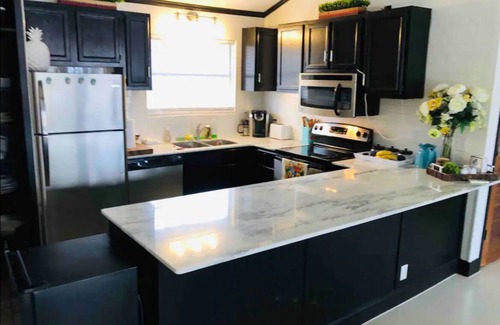 Dennis House | Secluded lake cabin - Waterfront with boat dock.