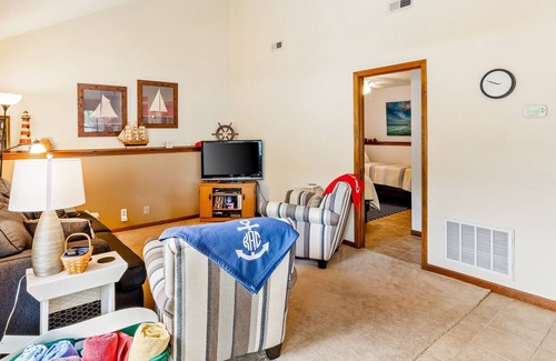 Sunrise Beach Cabin | Secluded lakefront home with private dock, firepit, grill, water views, hammock