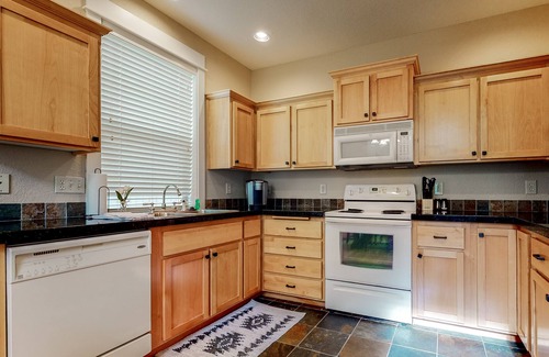 Redmond House | Secluded & sunlit desert oasis with pool, hot tub, tennis courts, & fireplace