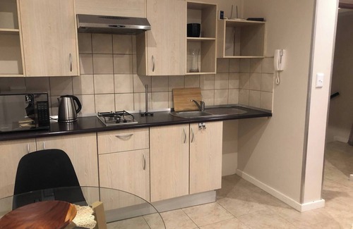 Greater Johannesburg Metropolitan Area Apartment | Secure Executive Apartment, WiFi, Solar Power, Netflix