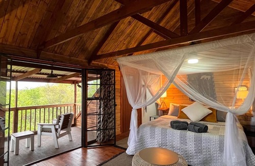 Marloth Park Cabin | See the Big 5 from the viewing deck of this incredible riverside bush lodge!