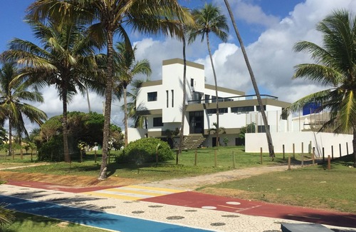 Canto do Mar House | Sensational beachfront home in the best condo in Guarajuba with large pool