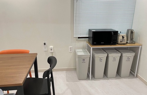 Jung-gu House | Serene building with WiFi in beautiful BusannThere is a large bed.