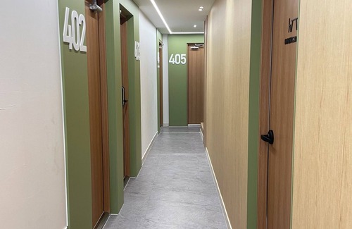 Jung-gu House | Serene building with WiFi in beautiful BusannThere is a large bed.