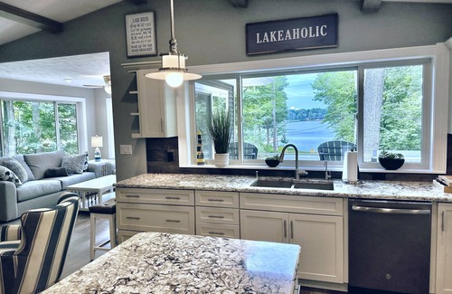 Grawn House | Serene Lakehouse - Private Beach, Kayaks, Pickleball, various games, and near TC