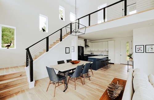 Young Harris Cabin | Serenity Now is a 4BR/3.5BA mountain retreat where fall shines. Gather by the gas fireplace, share meals in open living spaces, and relax on a large deck with sweeping views and changing leaves. Perfect for families, friends, or couples.