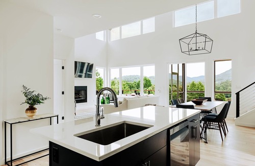 Young Harris Cabin | Serenity Now is a 4BR/3.5BA mountain retreat where fall shines. Gather by the gas fireplace, share meals in open living spaces, and relax on a large deck with sweeping views and changing leaves. Perfect for families, friends, or couples.