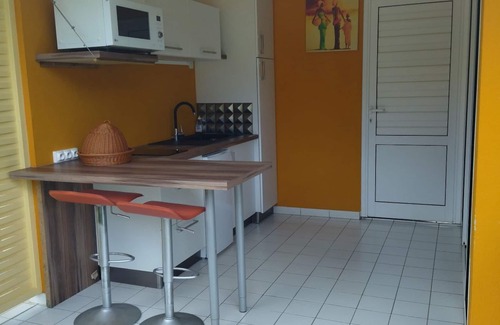 Marie-Galante House | Set in a lush green area, your bungalow is a few steps from a natural beach.