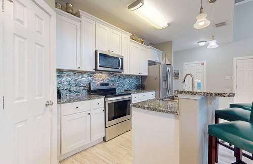 Safe Harbor Condo | Shared Pool, Pet Friendly, Golf Cart Access