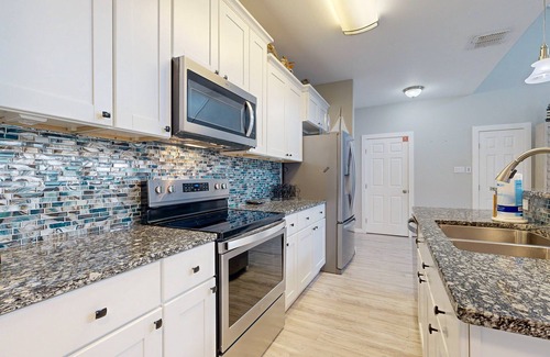 Safe Harbor Condo | Shared Pool, Pet Friendly, Golf Cart Access