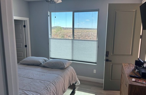 Kanab Bed & Breakfast | Shared space with owners. 2 bedroom and bath, swim spa, golf green,great views.