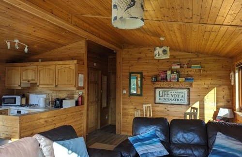 New Forest District Ski Chalet | Shorefield Lodge by the Lake