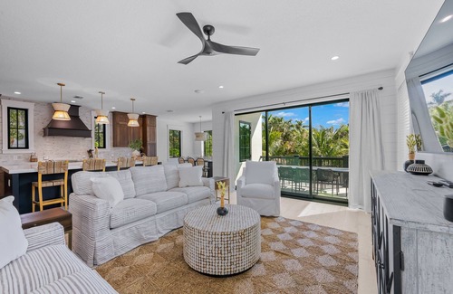 Saint Armands Key House | Showstopping home with a Pool, Rooftop Deck, and Games! Sun-Day Style