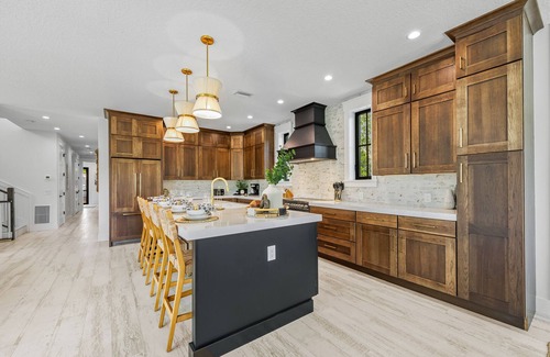 Saint Armands Key House | Showstopping home with a Pool, Rooftop Deck, and Games! Sun-Day Style