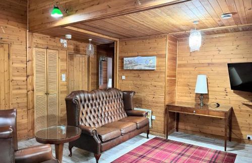 Llanybri Ski Chalet | Shrew Lodge-woodland Lodges-Hot Tub-Pembrokeshire-Tenby
