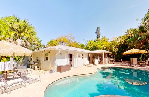 Bay Isle House | Siesta Key home with private pool, spa, fenced yard, screened lanai, & AC