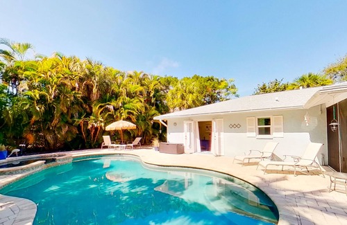 Bay Isle House | Siesta Key home with private pool, spa, fenced yard, screened lanai, & AC