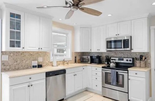 Avalon House | Single Family home which sits behind another Single Family home.