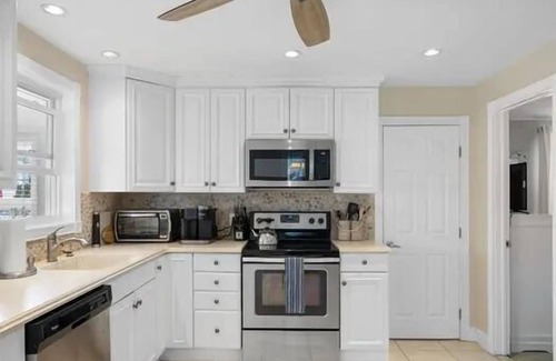 Avalon House | Single Family home which sits behind another Single Family home.