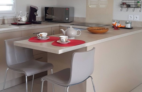 Carcassonne House | Single-storey house with garden in residential area