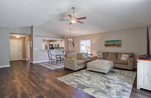 Sandalwood House | Single-story home with lagoon view, garden patio & easy drive to the beach