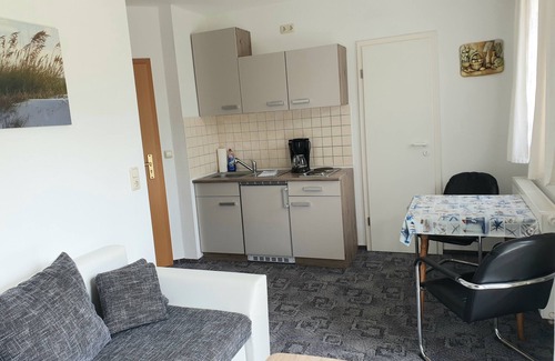 Wieck auf dem Darss Apartment | Small cozy vacation apartment with well-kept green property - Buhne I (ground floor)