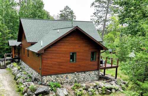 Cook House | Snowmobile Retreat with Trailer Parking, Screen Porch, Sauna, 3 Bedrooms & Loft.