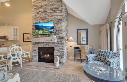 Charlevoix Condo | Soaring Ceilings & Lake Views | Downtown Charlevoix | Pool, Hot Tub, Sauna