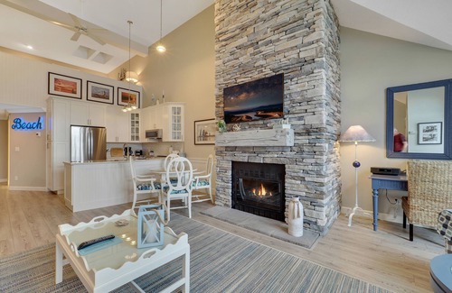 Charlevoix Condo | Soaring Ceilings & Lake Views | Downtown Charlevoix | Pool, Hot Tub, Sauna