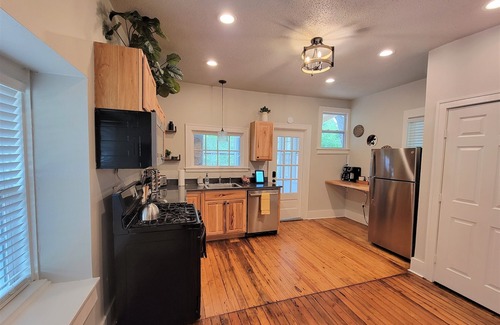 Norman House | Sojourn Sanctuary - 2.3 miles to OU with hot tub!
