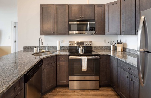 West Poplar Apartment | Sosuite | 2BR Apt w W/D, Gym, On-Site Restaurant