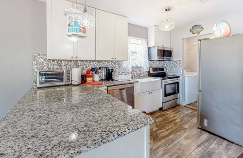 Gulf Breeze House | Soundside Vibes | House in Gulf Breeze with a pool, firepit, and beach access