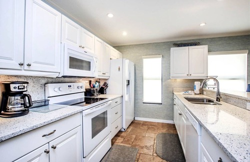 Captiva House | South Seas Beach House 15 - Direct gulf front home with pool and tennis