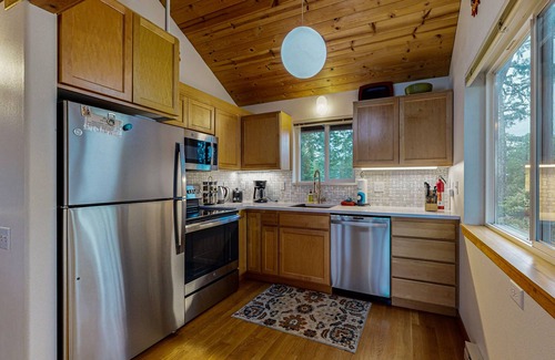 Manzanita House | Spacious 3-story home near the beach with water views, grill, deck, & firepit