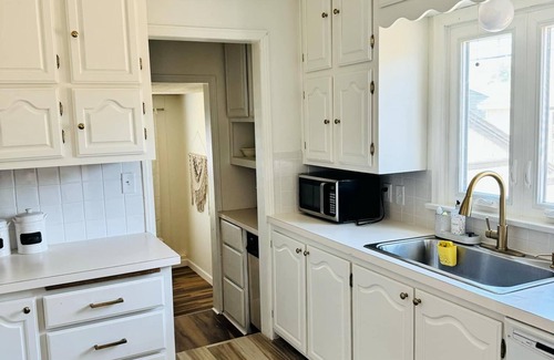 Great Bend House | Spacious 4-bedroom house in Great Bend, KS with, Backyard Deck, Ping Pong Table