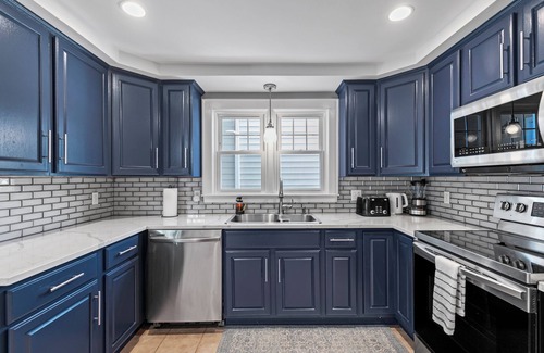 Stratford House | Spacious 5-bedroom house with a fun-filled game room and a fitness room.