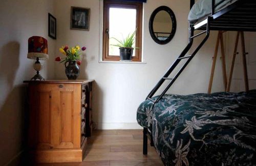 Gooseham House | Spacious cabin on isolated farm with sea view