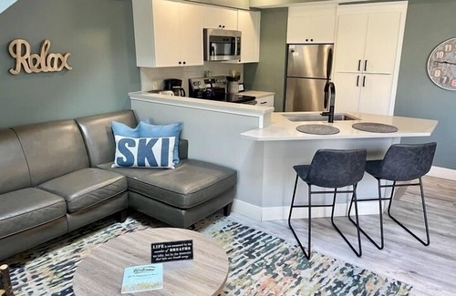 Thompsonville Condo | Spacious condo in the heart of Crystal Mountain with fireplace, walking distance