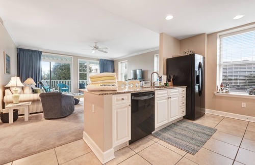 Upper Grand Lagoon Condo | Spacious family condo with large balcony & shared pool and hot tub