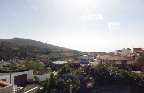 Vilaflor Apartment | Spacious Family room that can accommodate up to 2 adults and 1 child. En-suite bathroom with shower. There is a king size bed and a single bed if required. The room has views of the village square.