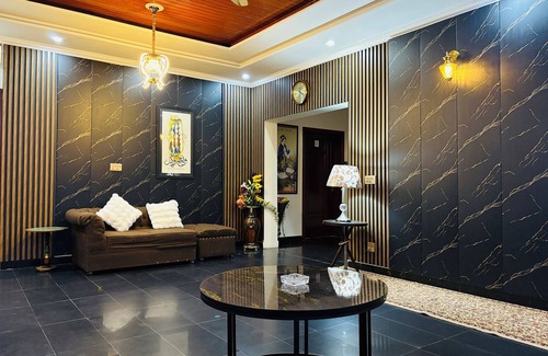 Lahore House | “Spacious King Rooms Prime DHA Location Perfect for Business & Family Stays