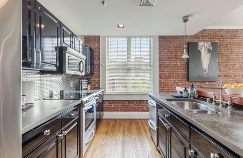 Greenville Downtown Apartment | Spacious Main St Loft | 2BD/2BA + Low cost parking