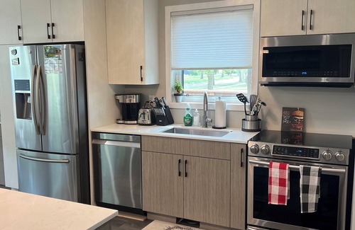 Tuxedo House | Spacious modern home with fully fenced yard. Pet friendly! Quiet neighbourhood.