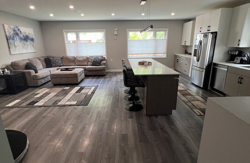 Tuxedo House | Spacious modern home with fully fenced yard. Pet friendly! Quiet neighbourhood.