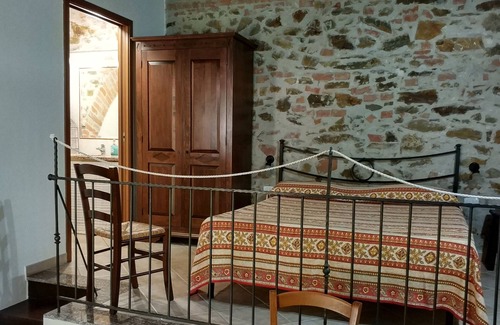 Grosseto Other | Spacious one-bedroom apartment with large bedroom, porch over entrance and pool