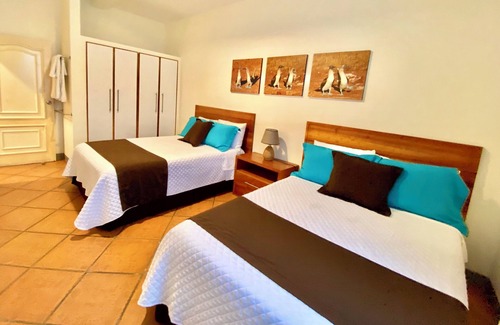 Bahia de la Academia Apartment | Spacious two-bedroom suite with a balcony