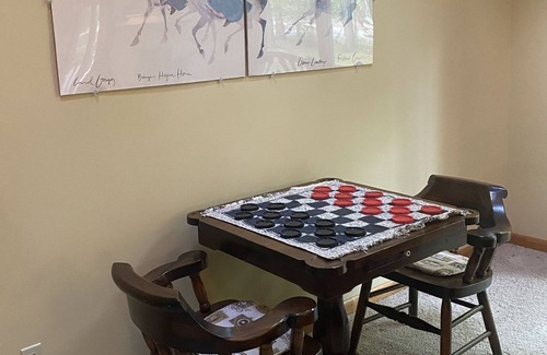 Higgins Lake Ski Chalet | Spacious wooded chalet minutes from beaches