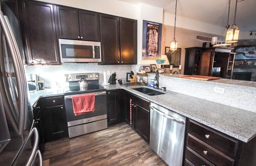 Longmont House | SpeakEasy Suite, relax in classic luxury with private living space and bedroom