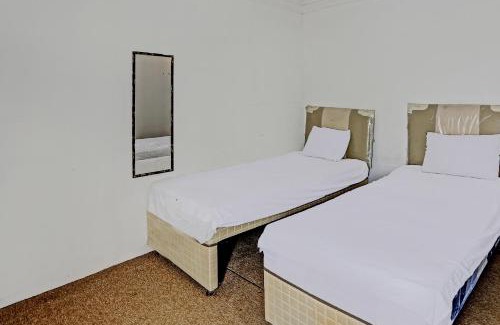 Kalimantan Hotel | SPOT ON 92529 Penginapan Wisma Bintang Syariah Near MTs Al Ma'arif Kota Bangun