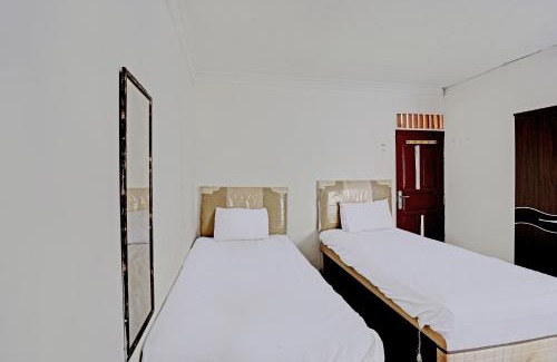 Kalimantan Hotel | SPOT ON 92529 Penginapan Wisma Bintang Syariah Near MTs Al Ma'arif Kota Bangun